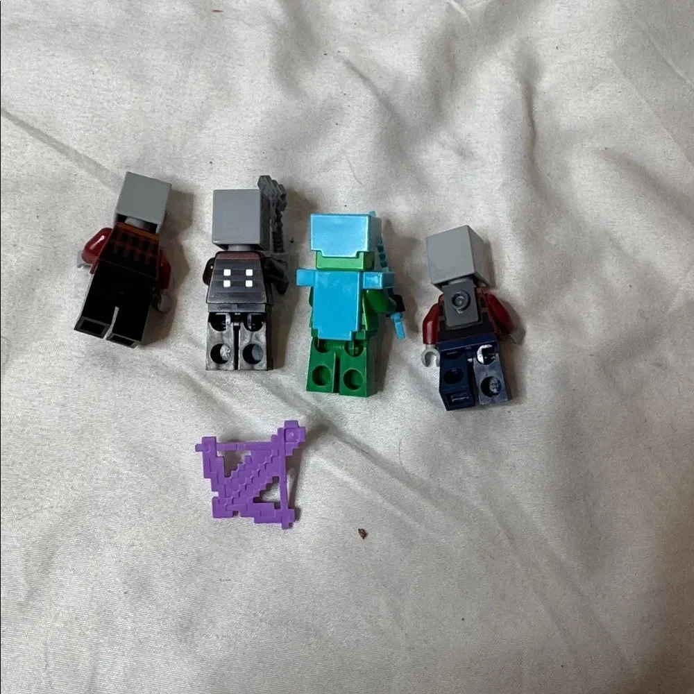 Set‎ of Four Lego Minecraft Miniature Figures with Accessories.